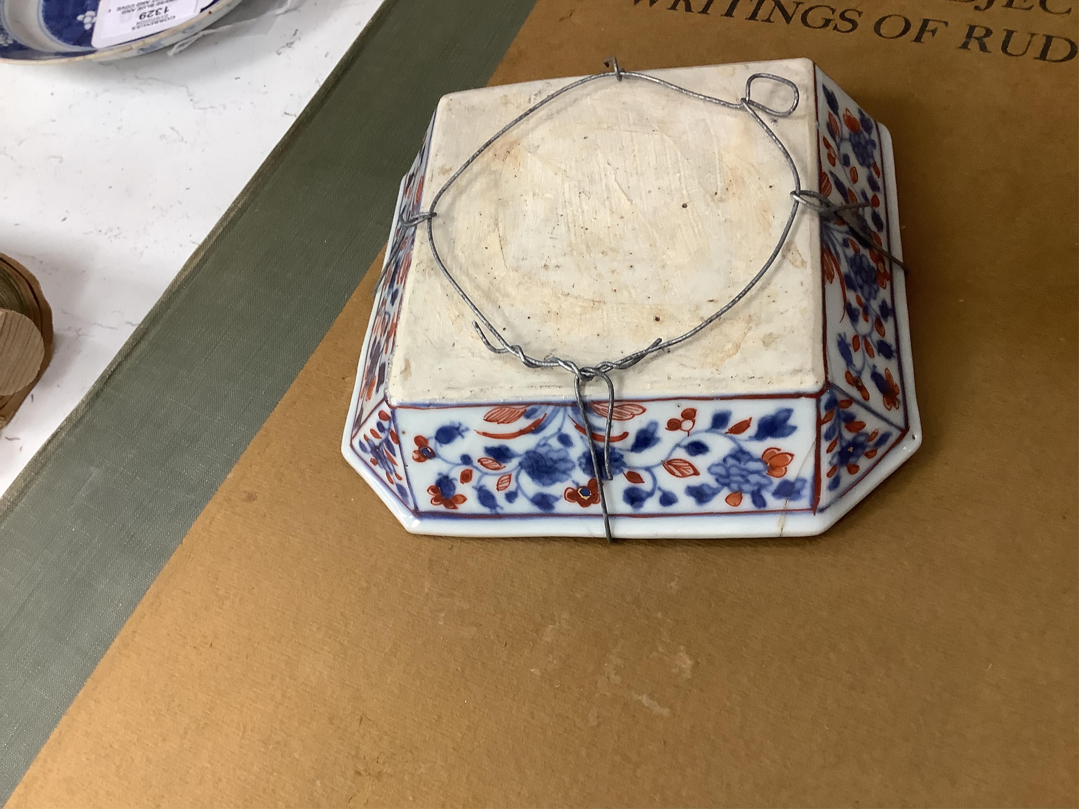 A Chinese blue and white teapot and cover, a prunus dish and an Imari patterned dish, all 18th century, teapot 19cm high. Condition - prunus dish and teapot cover chipped